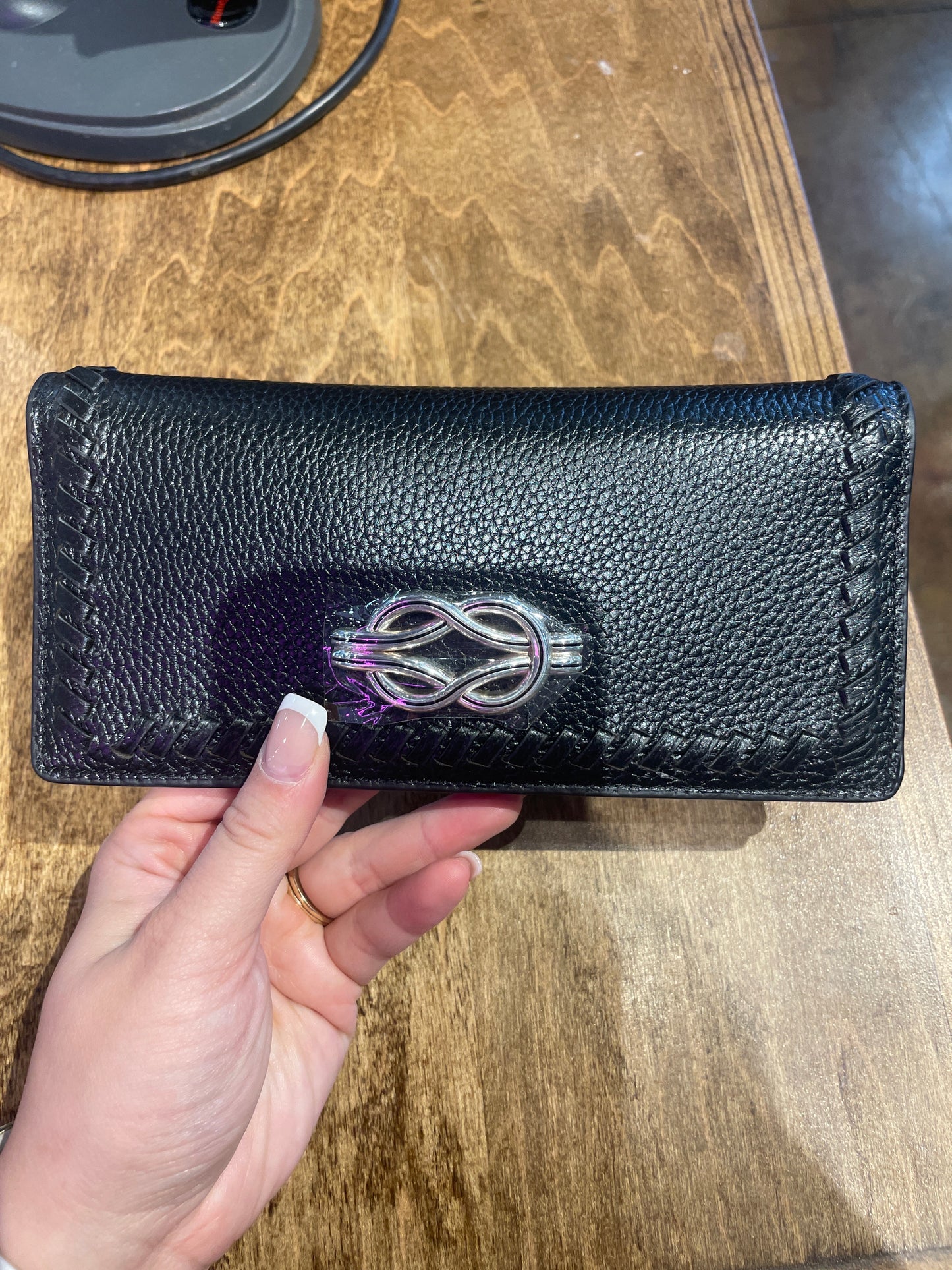 black brighton wallet with silver charm