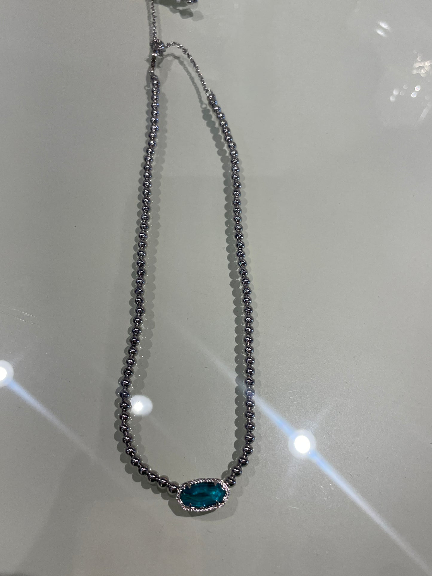 rode beaded nck with aqua