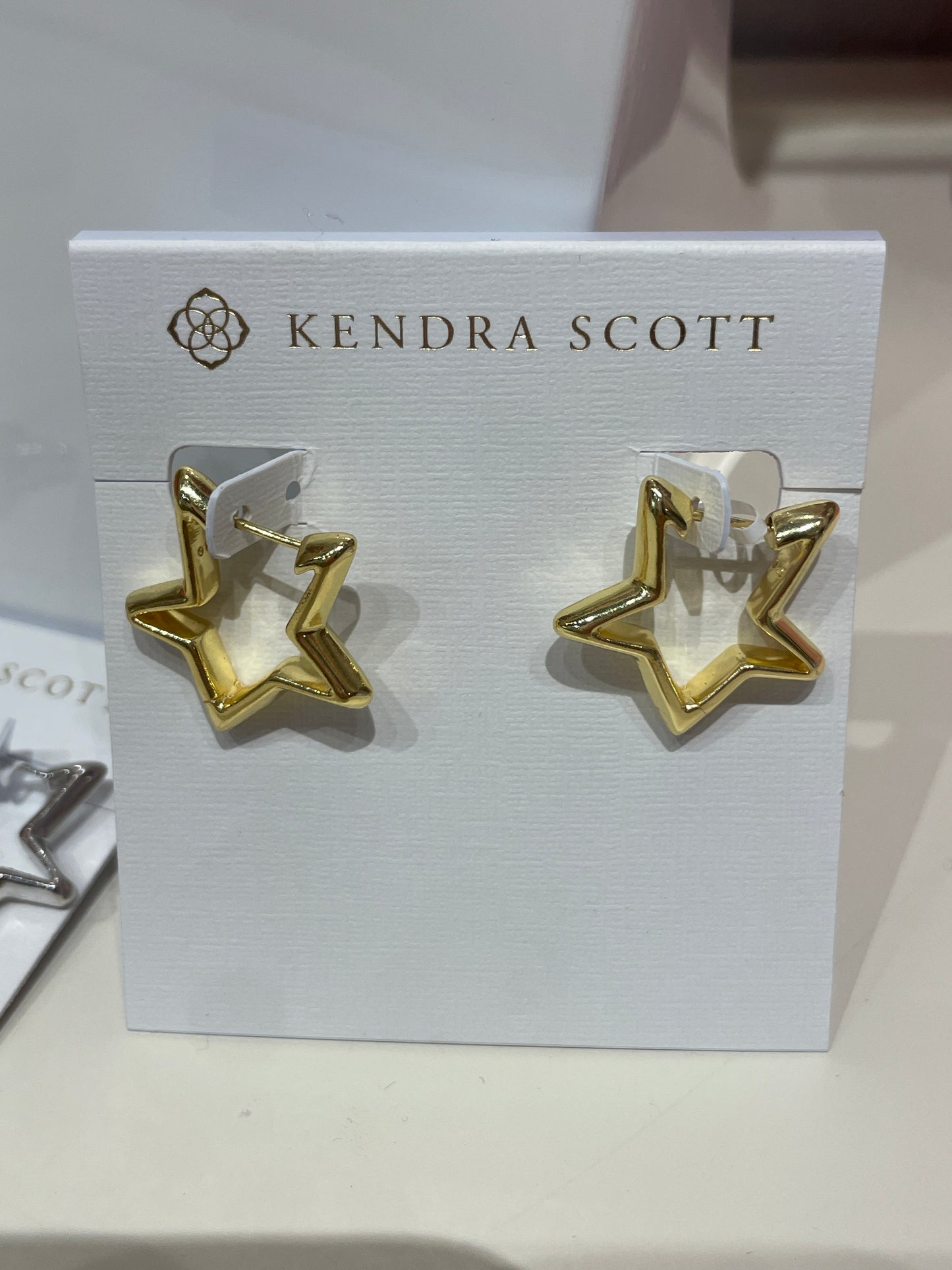 star huggie earrings