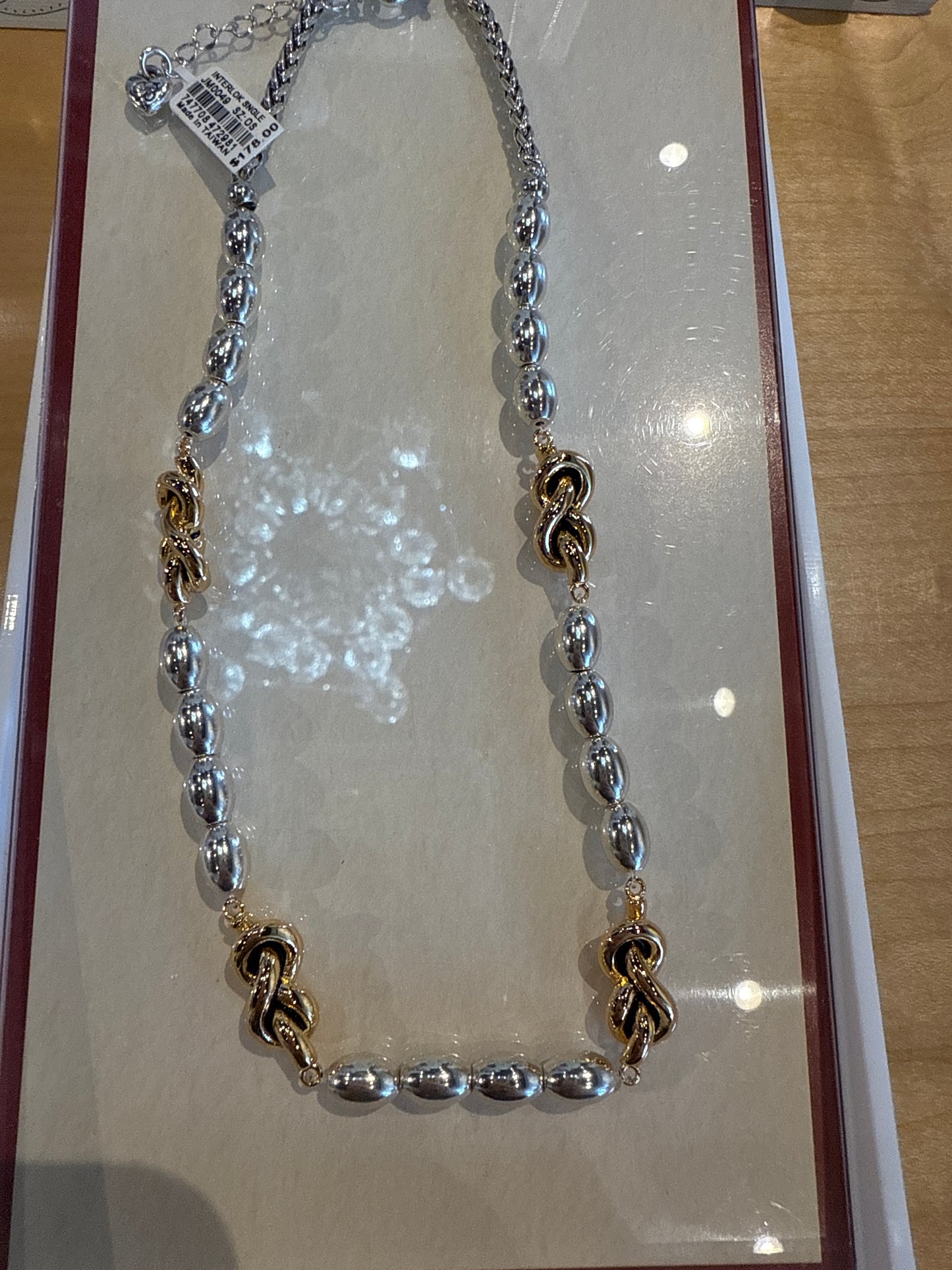 Interlock single mixed metal necklace