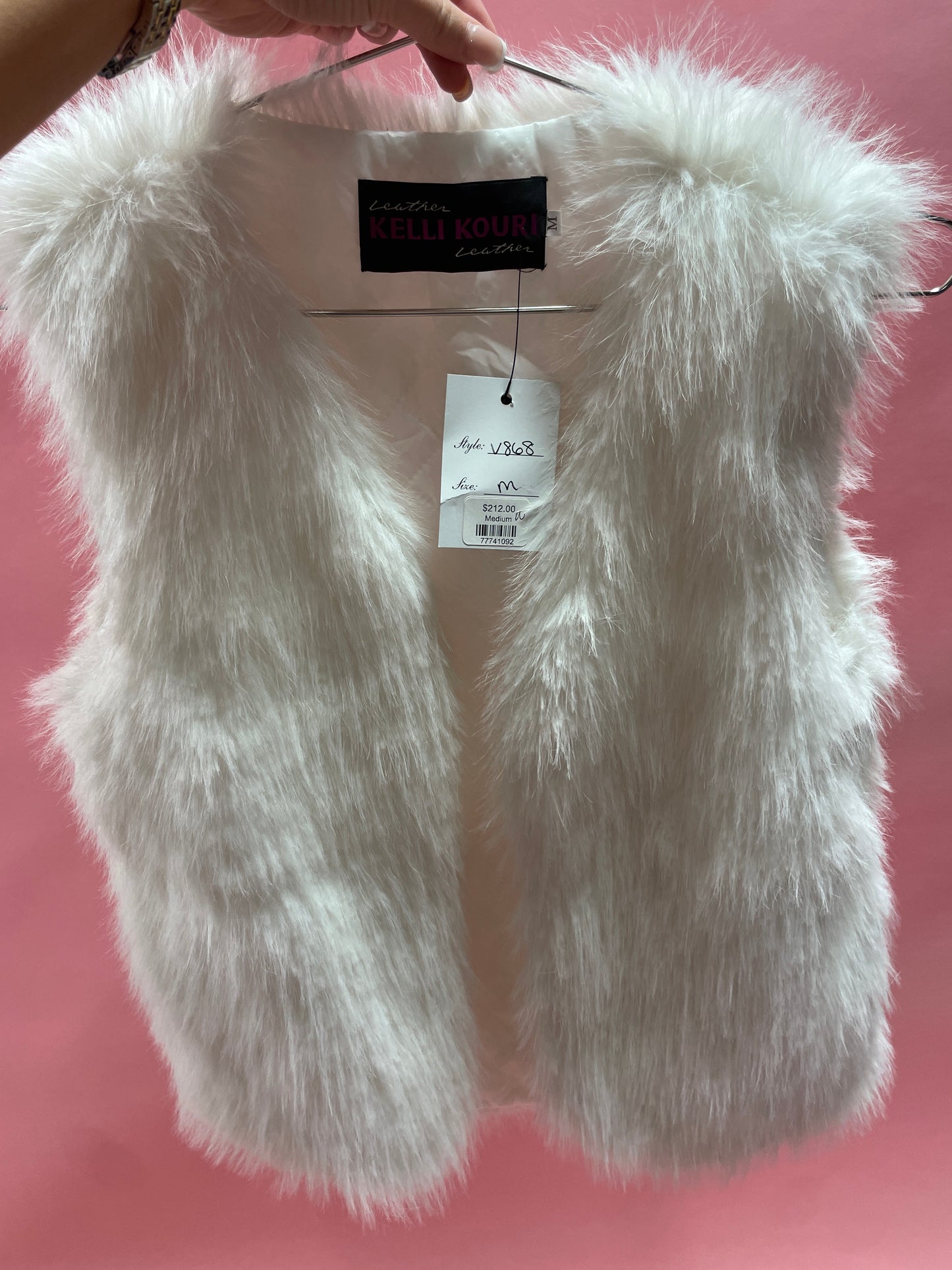 white fur vest