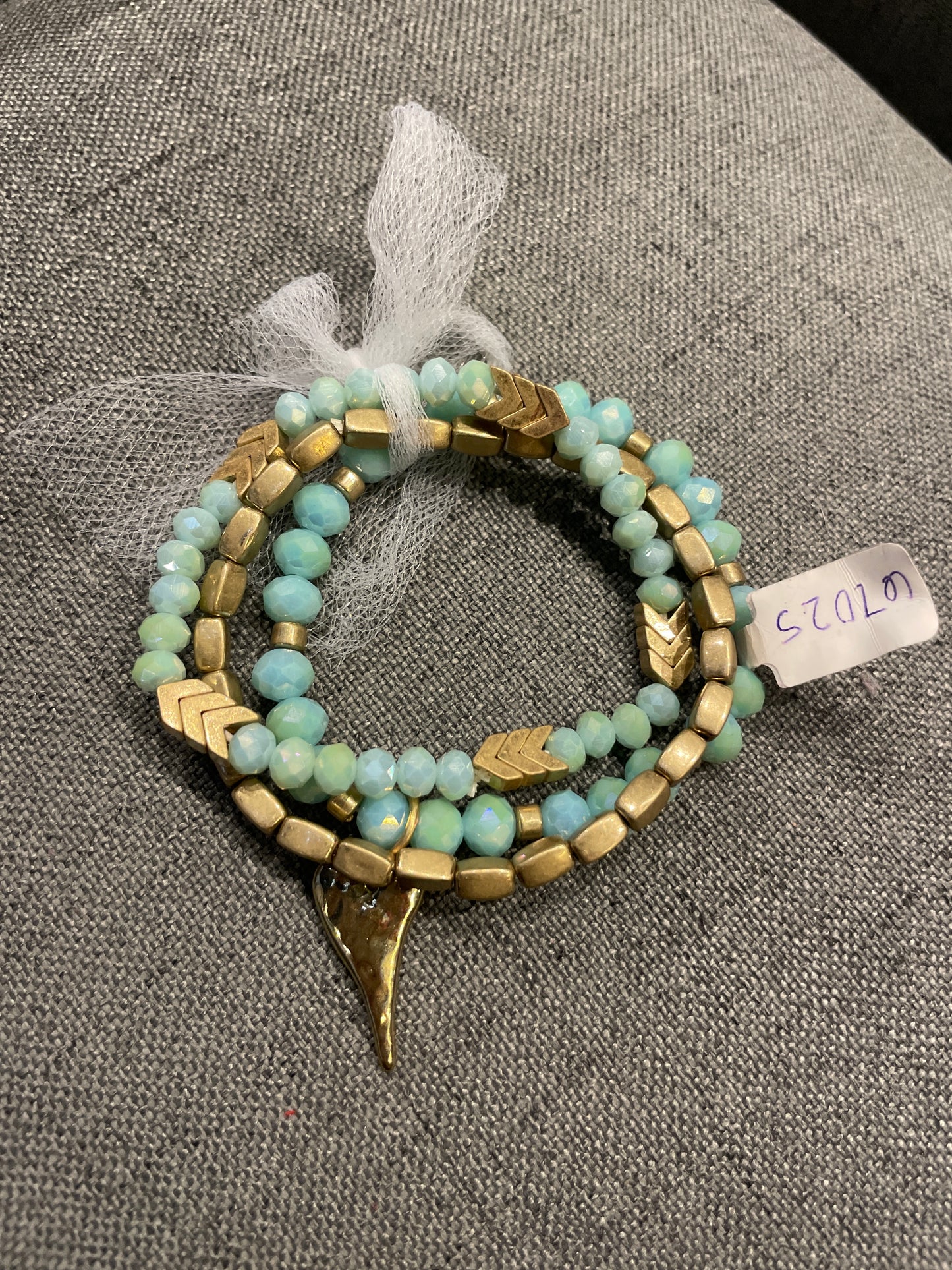 GOLD AND BLUE STACK BRACELETS