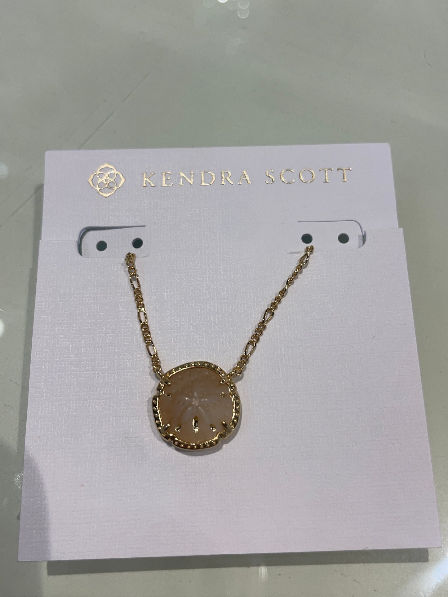 Sand dollar pendant necklace