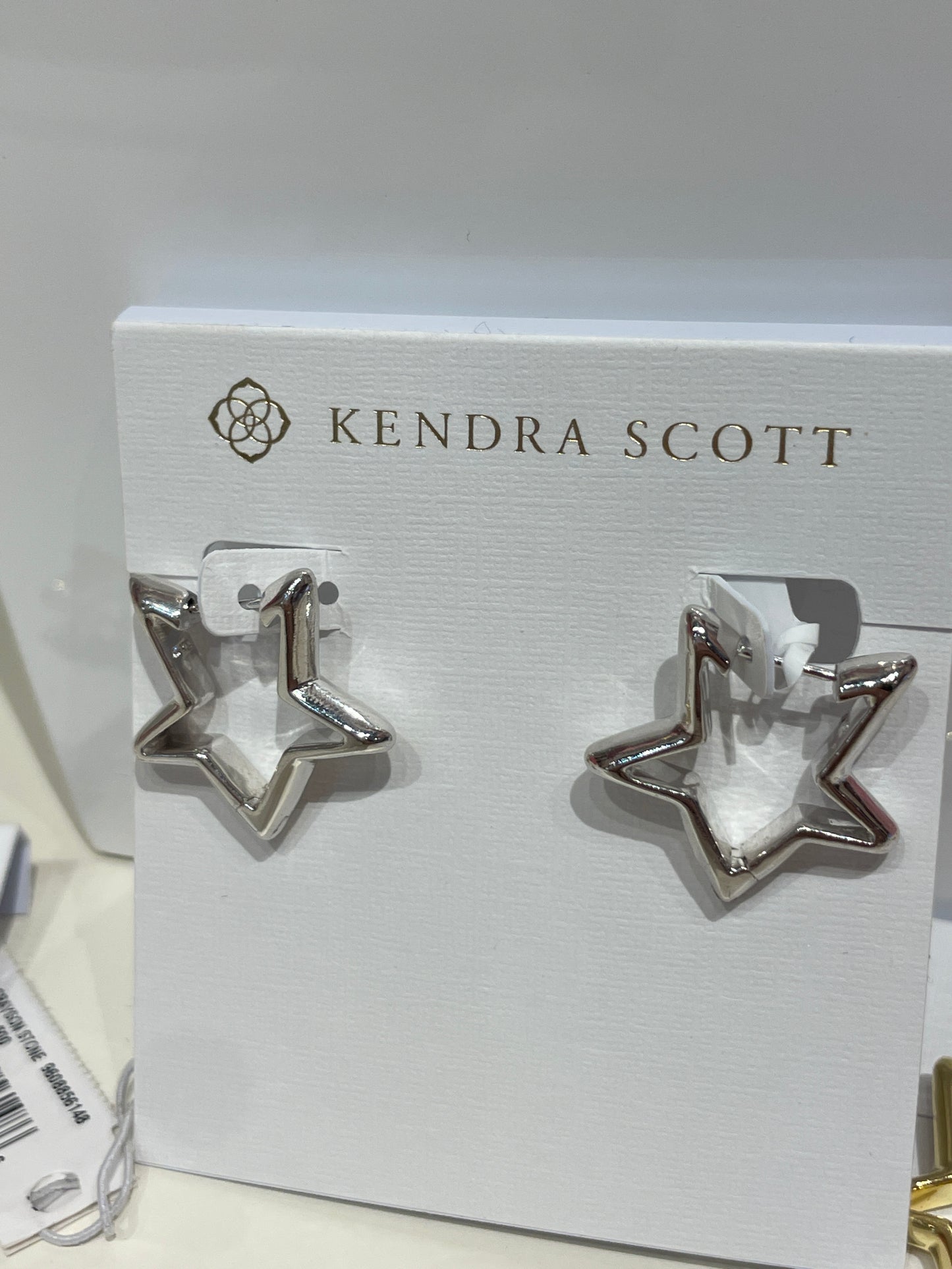 star huggie earrings