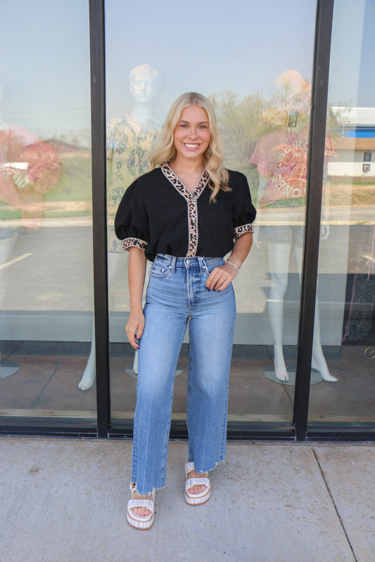 black blouse with leopard