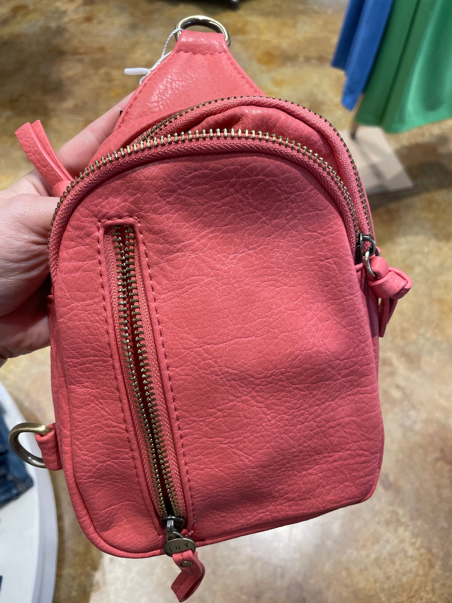 coral sky sling bag