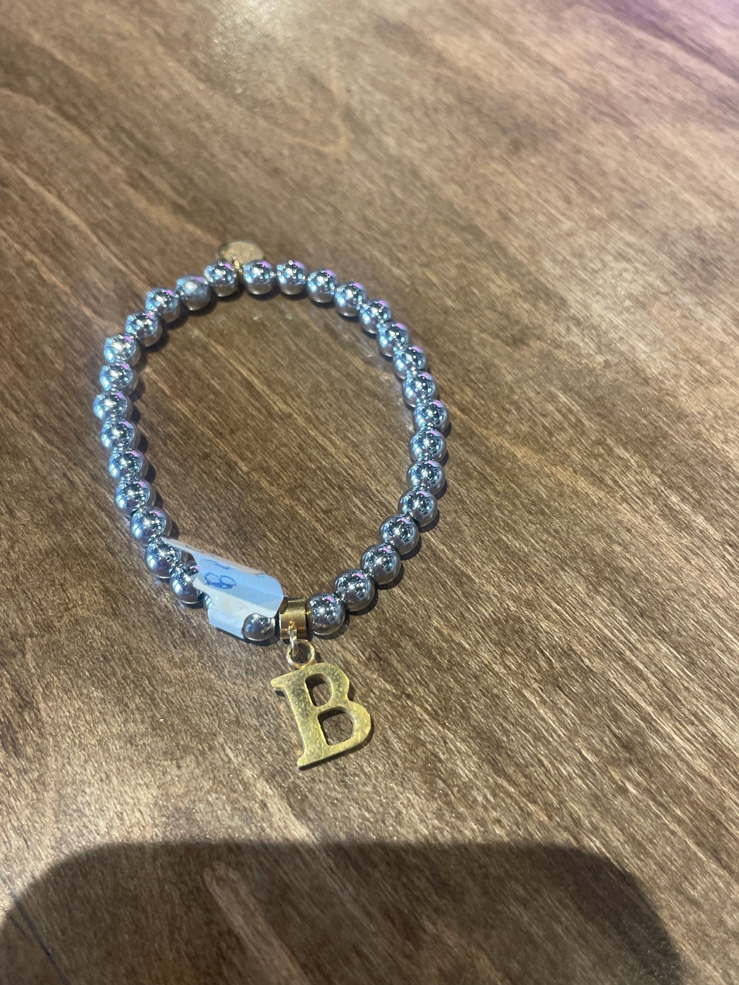 silver B charm
