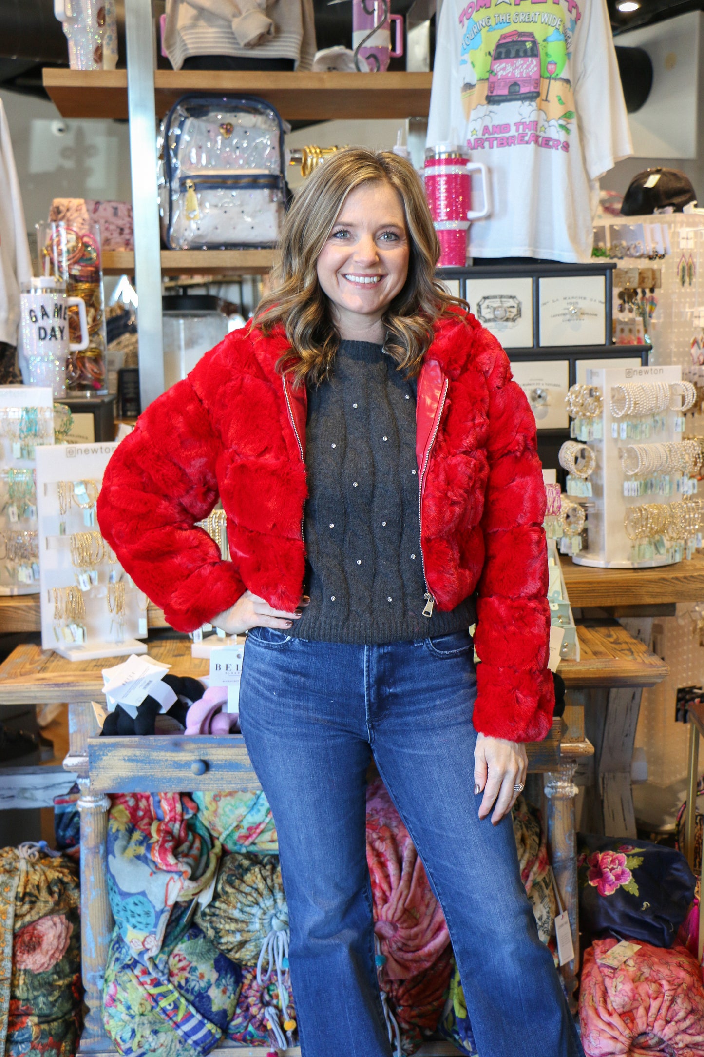 Faux fur puffer jacket with hoodie. Model is wearing small