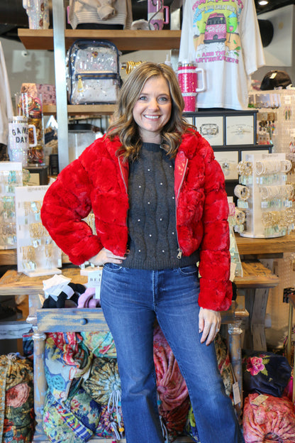 Faux fur puffer jacket with hoodie. Model is wearing small