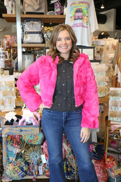 Faux fur puffer jacket with hoodie. Model is wearing small