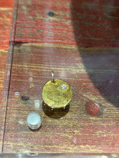 Mini gold charm