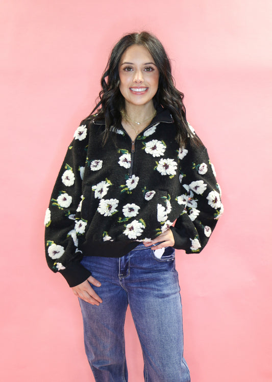 black fluffy quarter zip with flowers